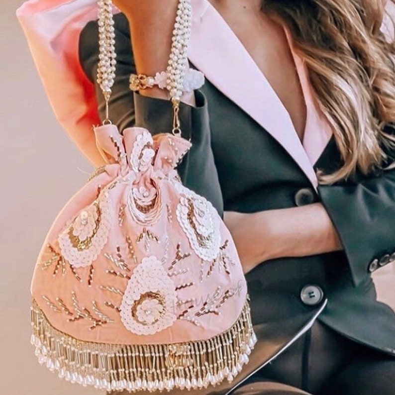 Velvet Potli in Pink and Majenta with Bugle Beads work 1657190