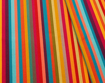 May include: A colorful striped fabric with a variety of bright colors, including red, orange, yellow, green, blue, and purple.