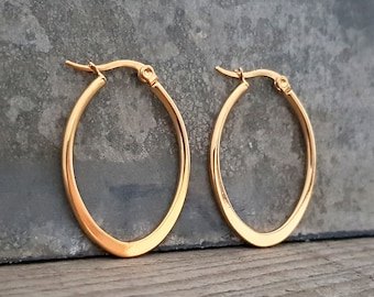 Pendientes de aro ovalados, plata/oro: fabricados en acero inoxidable quirúrgico *Hipoalergénicos, 1 par, aptos para personas alérgicas