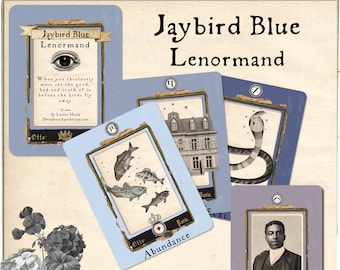 May include: A set of 3 Jaybird Blue Lenormand tarot cards with illustrations of fish, a house, and a snake. The cards are blue and white with gold trim. The text on the cards reads "Abundance", "Masculine", and "Jaybird Blue Lenormand".