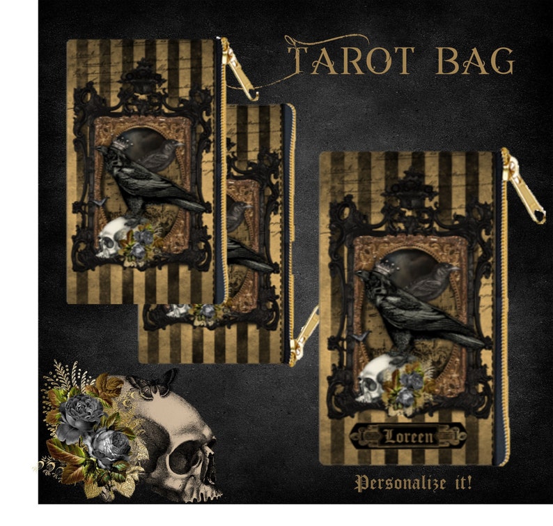 May include: A black and gold tarot bag with a zipper closure. The bag features a black raven, a skull, and a floral design. The bag is personalised with the name "Loreen".