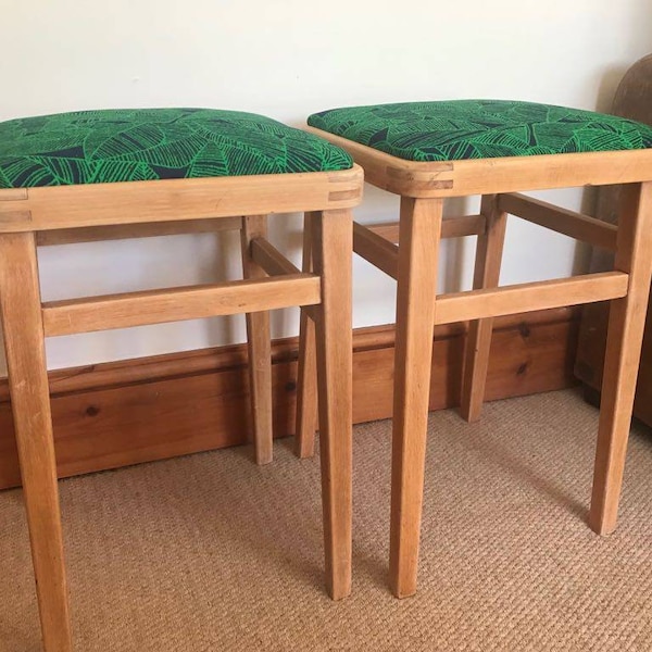 A pair of upcycled mid century stools