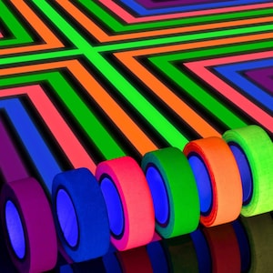 May include: A set of eight neon colored gaffer's tape rolls. The rolls are arranged in a rainbow pattern with the colors green, orange, red, blue, purple, pink, yellow, and black.