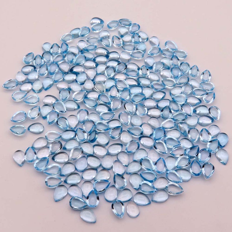 Sky Blue Topaz Natural Loose Gemstone Pear 7x10mm Cabochon AAA Quality