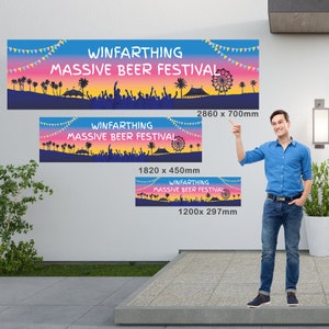 May include: Three banners with the text "WINFARTHING MASSIVE BEER FESTIVAL" in white, against a colorful sunset background. The banners vary in size: 2860 x 700mm, 1820 x 450mm, and 1200 x 297mm. A man in a blue shirt and jeans points at the banners.