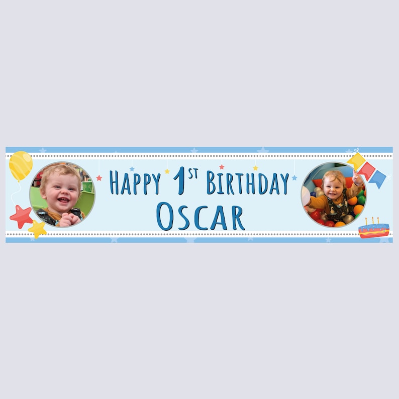 May include: A light blue banner with the text "Happy 1st Birthday Oscar" in dark blue. The banner includes two circular photo frames with a child's image, along with star and balloon illustrations. A cake illustration is also present.