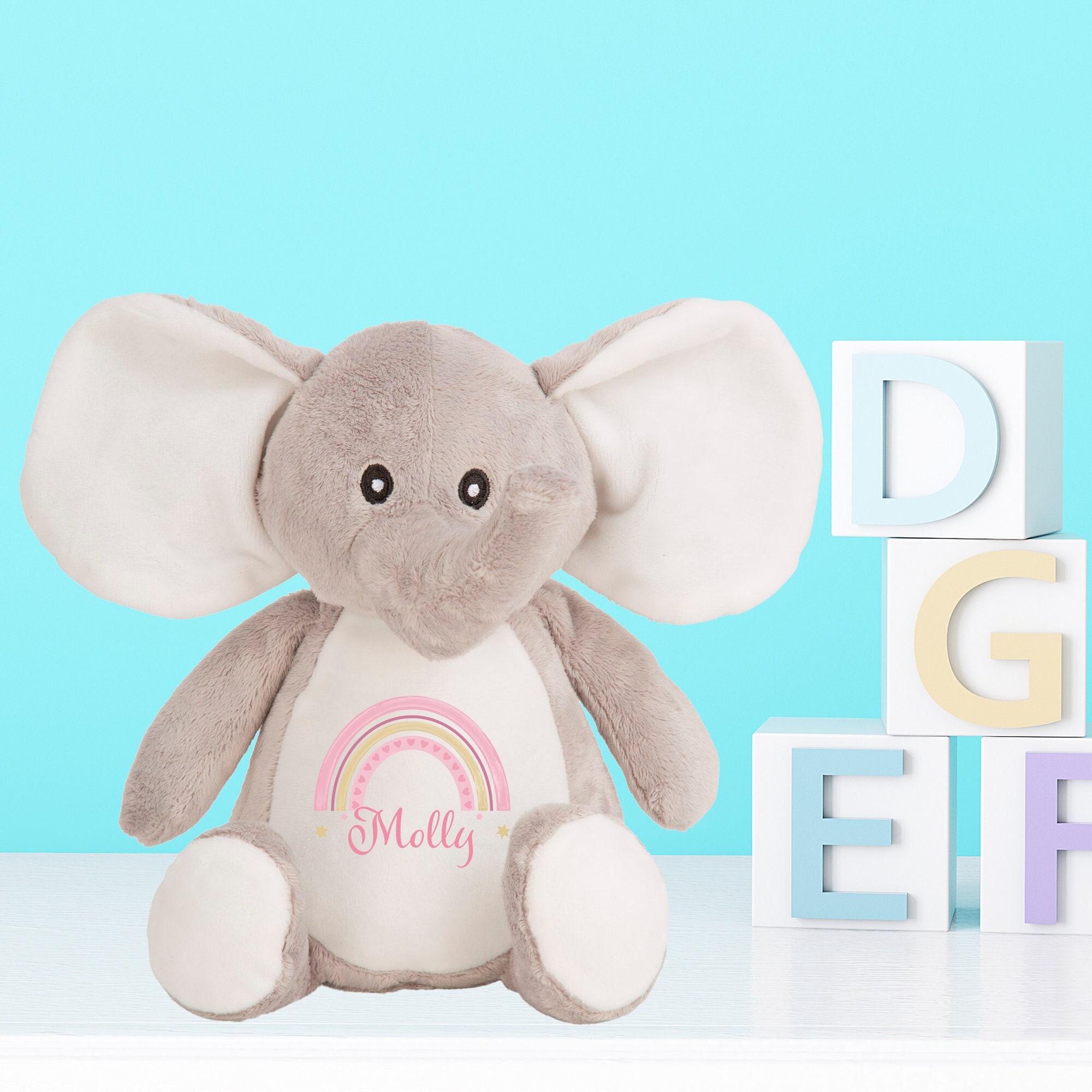 Rainbow elephant best sale stuffed animal