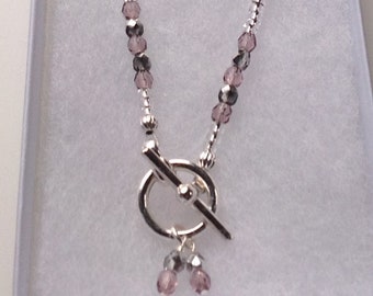 Dusky pink and silver Preciosa crystal toggle clasp necklace. With black card gift box.