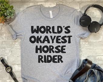 World's Okayest Horse Rider Shirt. T-shirt. Shirt. Sweatshirt. Hoodie. T-Shirt. Tank Top.