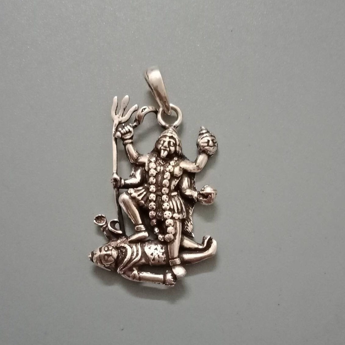 Kali on Shiva pendant in sterling silver, Kali's weapon, 925, Trident pendant, Durga's weapon, Sword, Demon's head, skull garland