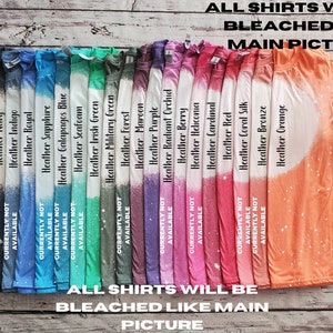 May include: A row of 20 t-shirts in various heather colours, bleached with a white splatter pattern. The text "ALL SHIRTS WILL BE BLEACHED LIKE MAIN PICTURE" is printed at the top and bottom of the image.