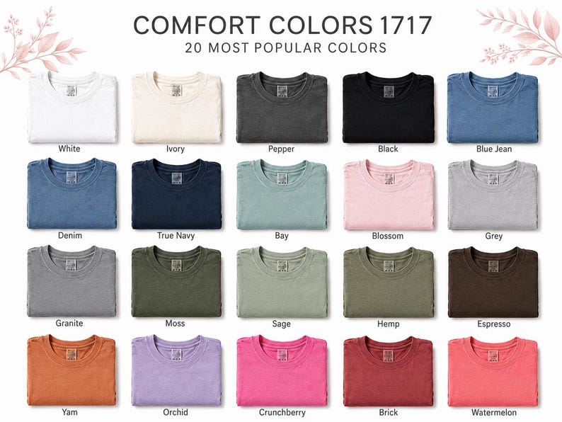 May include: A colour chart for Comfort Colors 1717 t-shirts displaying 20 folded shirts in various shades including white, ivory, pepper, black, blue jean, denim, true navy, bay, blossom, grey, granite, moss, sage, hemp, espresso, yam, orchid, crunchberry, brick, and watermelon.