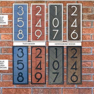 May include: Two sets of house numbers, 107, 246, and 358, in white on blue, red, gray, and brown backgrounds. The numbers are in a tile design and a herringbone design.