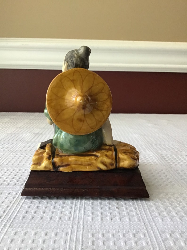 Vintage Chinese Ceramic Figurine On A Wooden Base