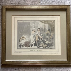 May include: Framed antique print with a gold-colored frame. The print depicts a scene with several figures in period clothing, a dog, and the text "FOUR O'CLOCK IN THE COUNTRY". The artwork is in muted tones of gray, beige, and light blue.