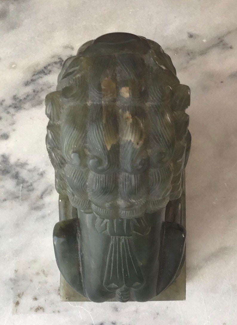 jade foo dog statues