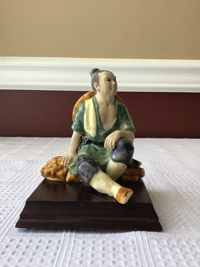 Vintage Chinese Ceramic Figurine On A Wooden Base