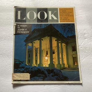 May include: A vintage Look magazine issue dated December 31, 1963, featuring a cover photograph of the White House at night in winter. The text reads In Memory of John F. Kennedy, Side Effects A New Worry for Doctors and Patients, and I'm Only Human.