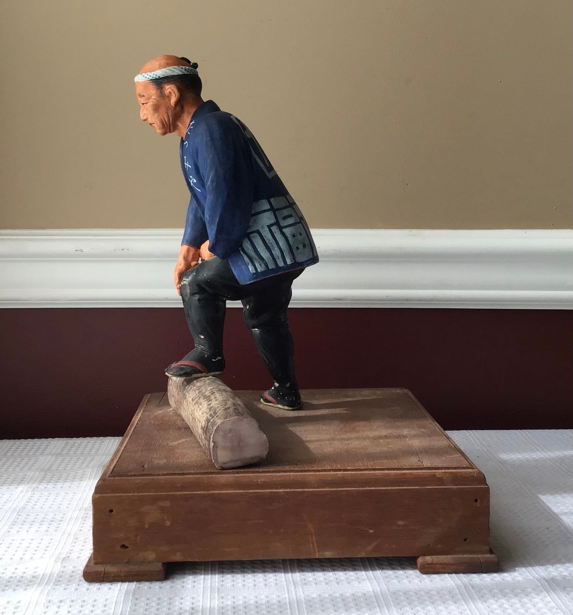 Vintage Japanese Ceramic Lumberjack Figurine in Traditional Dress