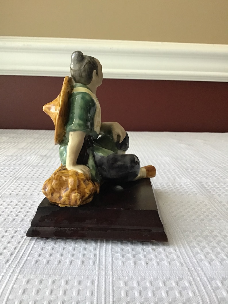 Vintage Chinese Ceramic Figurine On A Wooden Base