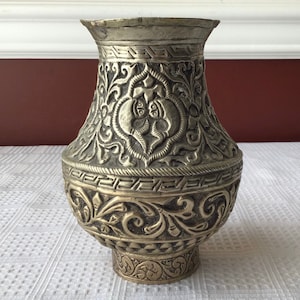 Antique South American hand hammered metal vase, 5 5/8”