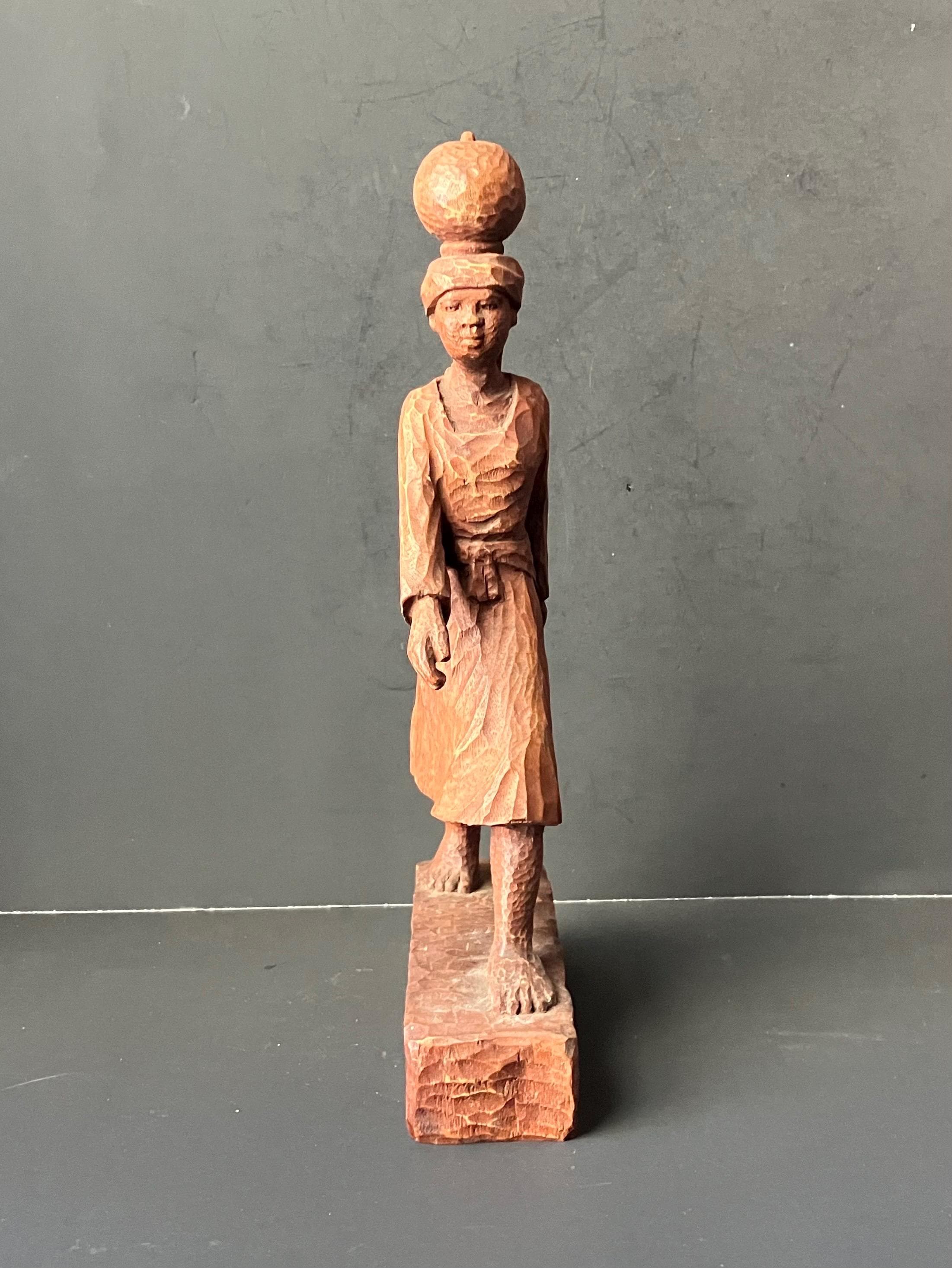 VTG Haitian Wooden Carved Statue of Woman Walking Signed J. Delva