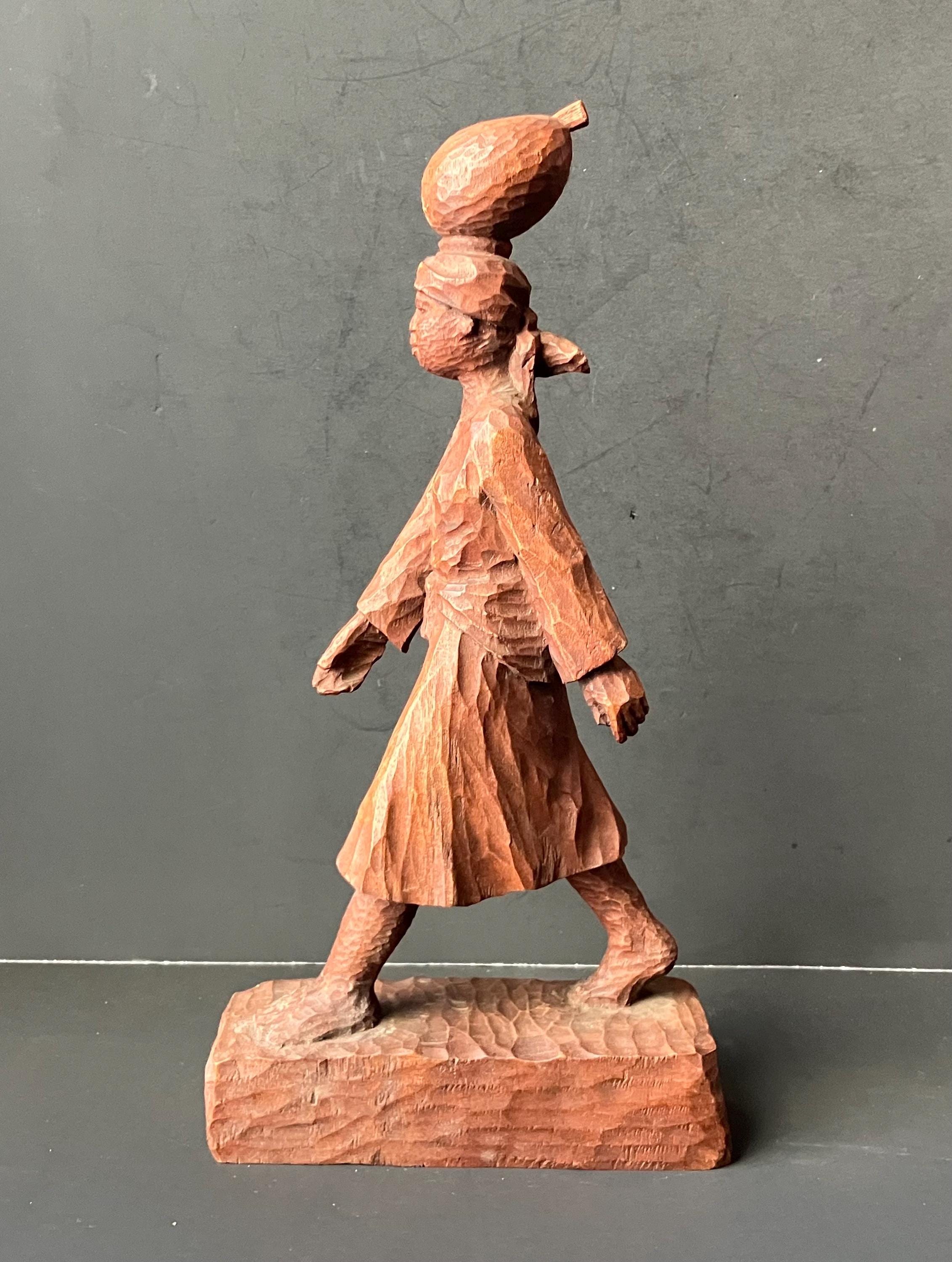 VTG Haitian Wooden Carved Statue of Woman Walking Signed J. Delva