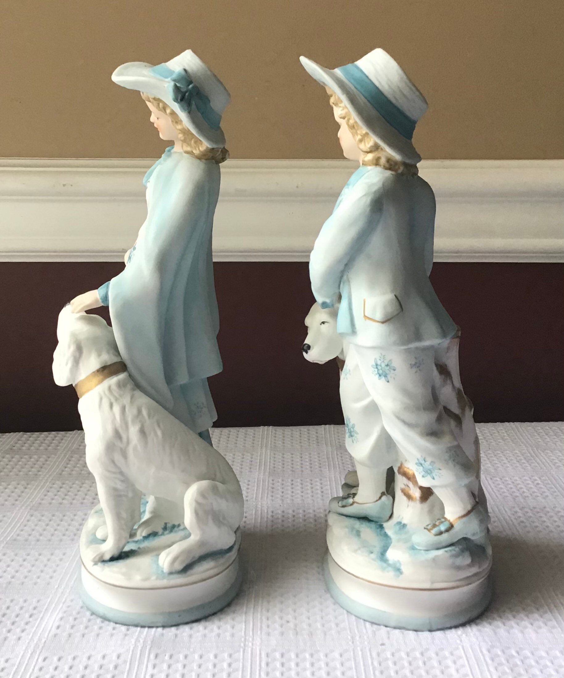 Pair of Vintage Ceramic Victorian Style Boy & Girl With Dogs