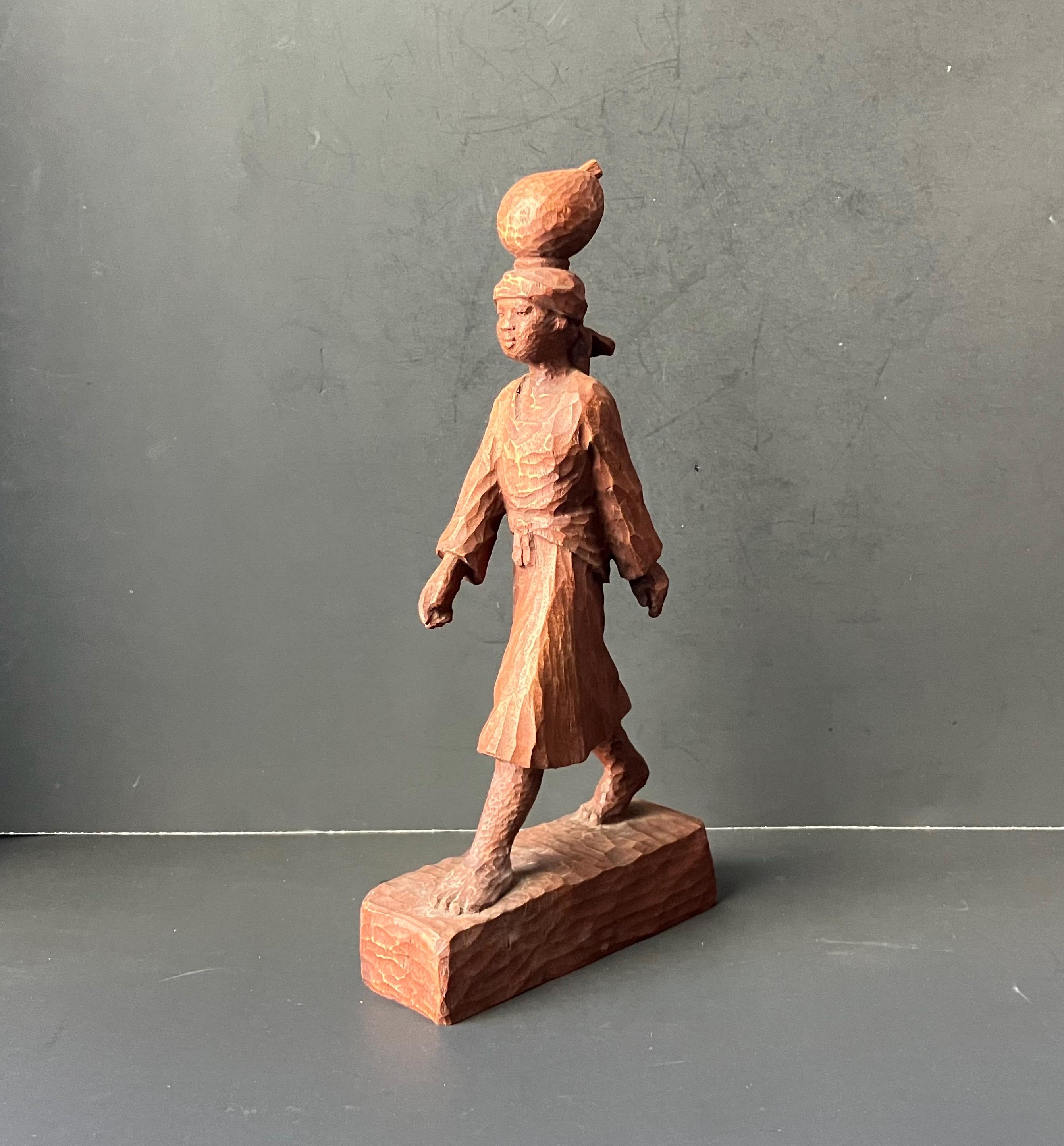 VTG Haitian Wooden Carved Statue of Woman Walking Signed J. Delva