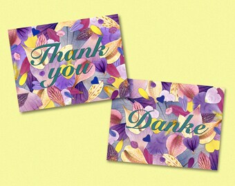 Thank you cards with handmade pressed flower designs with white envelopes