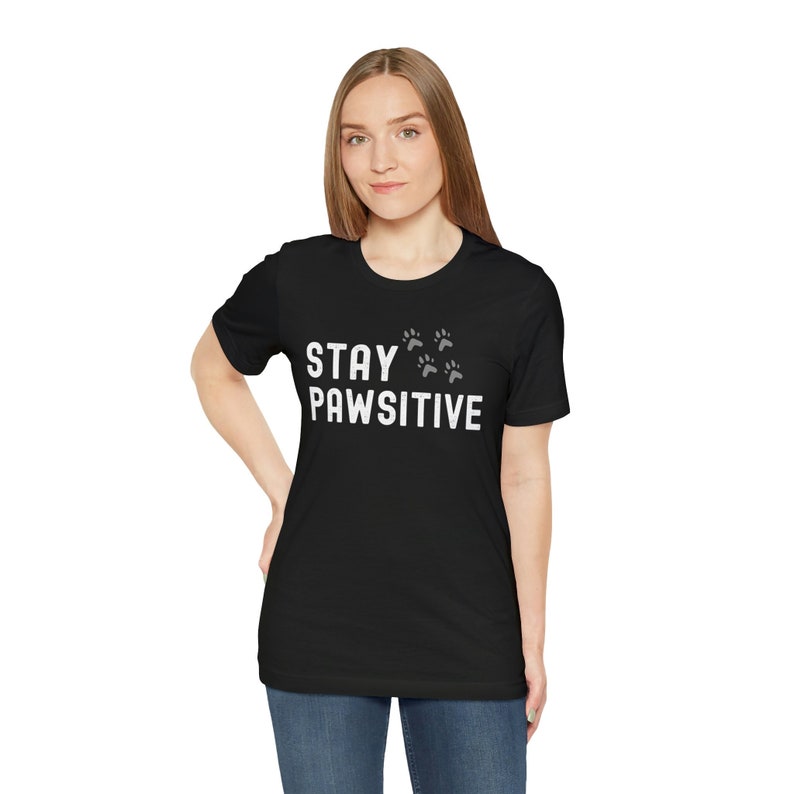 Stay Pawsitive Dog Paw Print Shirt, Cat Paw Print Shirt, Dog Lover T-shirt, Cat Lover T-shirt, Pawsitive Vibes, Funny Pet Motivation Quote image 1