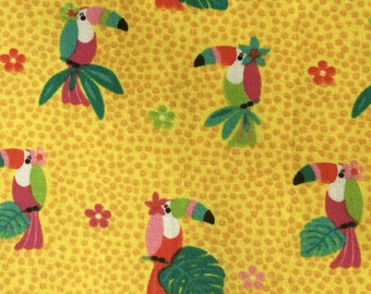 Tela de jersey de algodón con estampado de aves tropicales y loros tucán