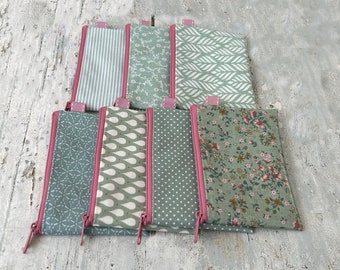 Wallet / Small bag for money, cosmetics, jewelry, medicine, plasters, soap... made of oilcloth in pastel shades of green.