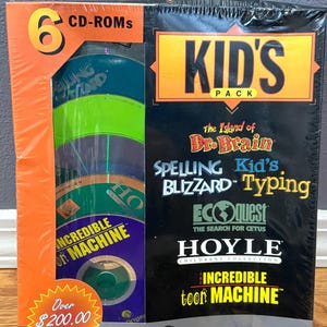 May include: A shrink-wrapped box set titled Kid's Pack containing 6 CD-ROMs from Sierra Originals. The box features titles including The Island of Dr. Brain, Spelling Blizzard, Kid's Typing, EcoQuest The Search for Cetus, Hoyle Children's Collection, and The Incredible Toon Machine.