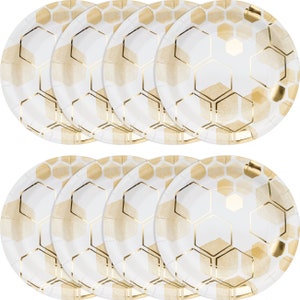 May include: Set of 12 white paper plates with a gold honeycomb pattern. The plates are perfect for a party or special occasion.