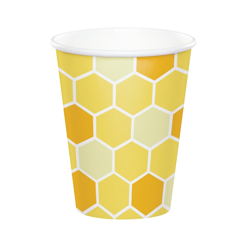 May include: A yellow and white paper cup with a honeycomb pattern.
