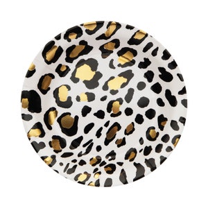 May include: White paper party plate with a black and gold leopard print design.