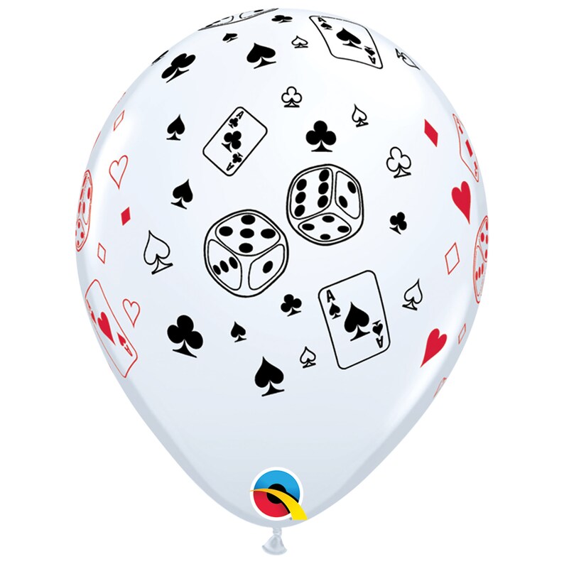 May include: A clear balloon with a casino theme. The balloon is covered with black and red playing card suits, dice, and playing cards. The balloon is inflated and ready for a party.