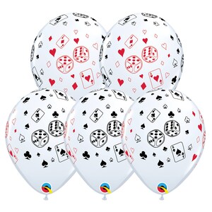 May include: A cluster of six white balloons with a casino theme. Each balloon is printed with black and red playing card suits, dice, and playing cards. The balloons are suitable for a party or event.