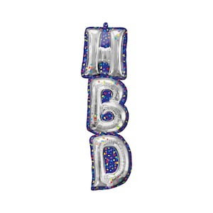 May include: Silver letter balloons spelling out "HBD" with a blue background and colorful confetti.