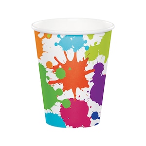 May include: A white paper cup with a colorful paint splatter design. The cup is perfect for serving beverages at a party or event.