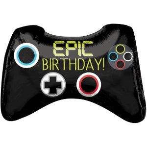 May include: Black and white video game controller balloon with the text "EPIC BIRTHDAY!" in yellow. The controller has a blue, red, and gray buttons.