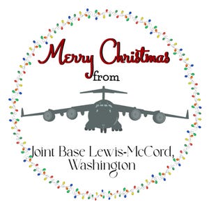 May include: A white background with a red and white wreath of Christmas lights. The text "Merry Christmas from Joint Base Lewis-McChord, Washington" is in the center of the wreath. A silhouette of a military cargo plane is in the center of the wreath.