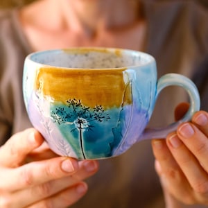 Colorful tea cup handcrafted pottery plants impressions, vibrant cup
