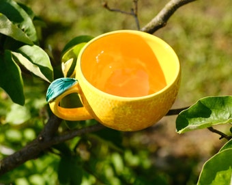 Orange fruit style mug, yellow vibrant mug tangerine fruit shape, handcrafted stylish mandarin fruit cup with leaf on handle