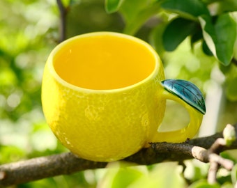 Lemon style mug, yellow vibrant mug lemon shape, handcrafted stylish fruit lemon cup with leaf on handle, coffee fresh mug