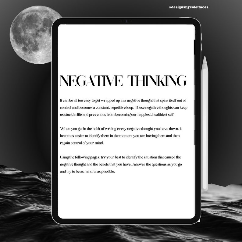 May include: A digital tablet with a white background and black text. The text reads "NEGATIVE THINKING" and includes a description of how to identify and manage negative thoughts. The tablet is on a dark background with a crescent moon visible in the top left corner.
