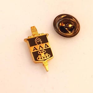 Insignia vintage de la Sociedad de Honor Alfa Lambda Delta, esmaltada en negro y dorada, para solapa, corbata o sombrero, recuerdo 1136