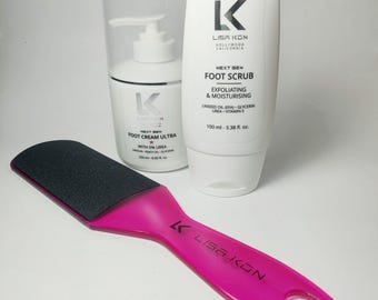 May include: A foot care set featuring a pink foot file, a white bottle of foot cream, and a white tube of foot scrub. The foot file has a black abrasive surface. The foot scrub tube is labeled "Next Gen Foot Scrub" and contains 100 ml (3.38 fl oz).