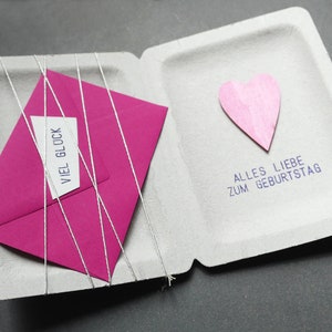 Buono regalo di compleanno in contanti con cuore di rosa